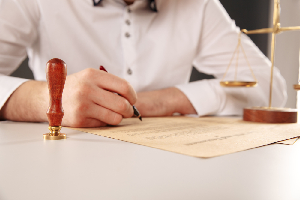 Male working as a notary person in North Carolina